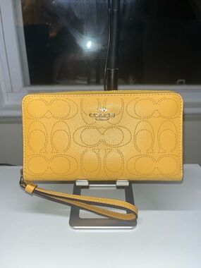 Coach Yellow Perforated Signature Long Zip Wallet